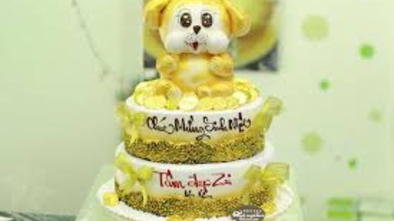 Bánh sinh nhật con chó 2 tầng màu vàng