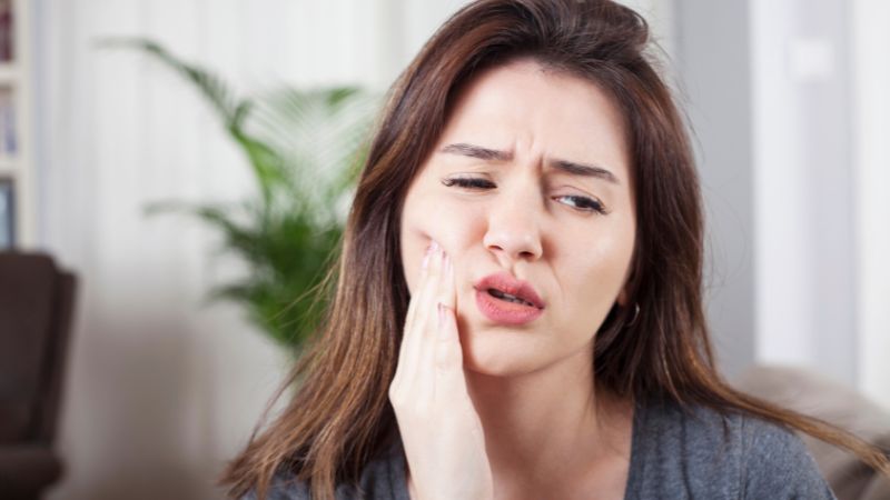 Biểu hiện đau đầu do mọc răng khôn mà bạn cần biết