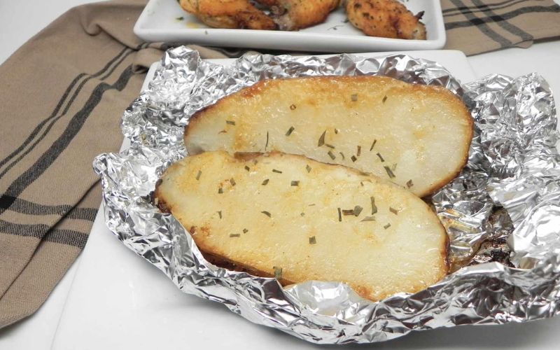 Grilling potatoes with aluminum foil