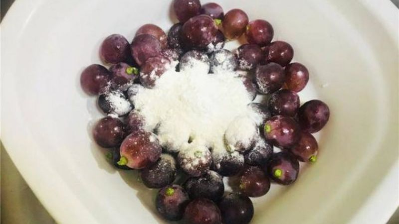 Wash grapes with flour