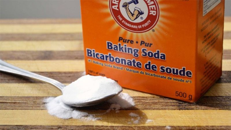 Use boiling water mixed with vinegar or baking soda