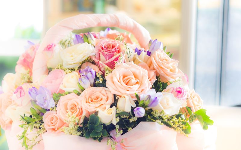 Birthday basket with multi-colored roses