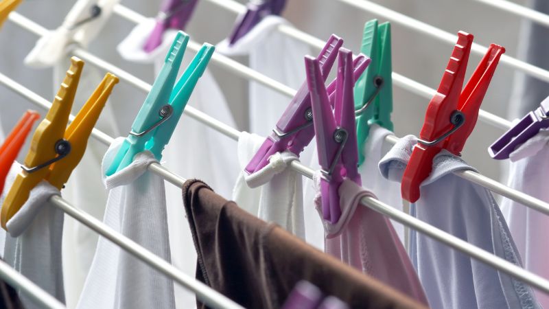 Not hanging clothes immediately after washing