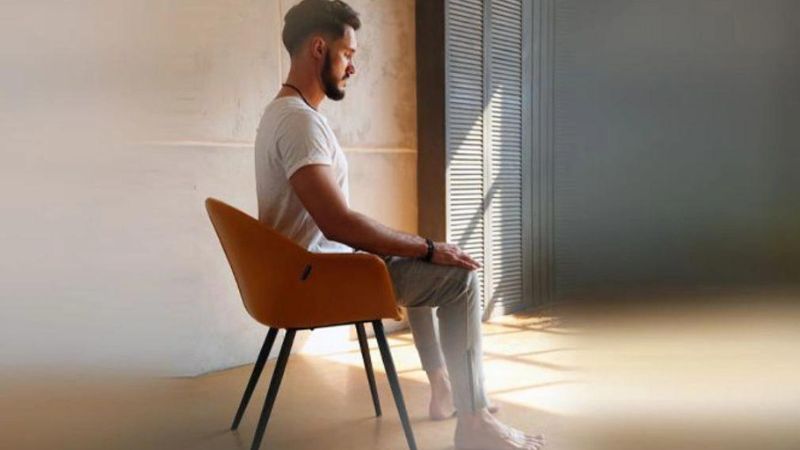 Meditation posture on a chair