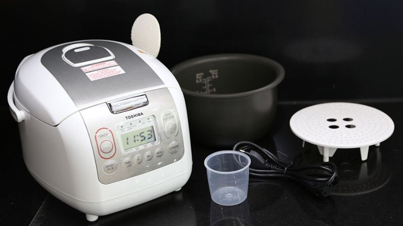 Use an electric rice cooker with appropriate capacity and power