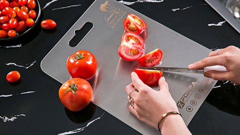 Do not use a stainless steel cutting board to chop hard objects