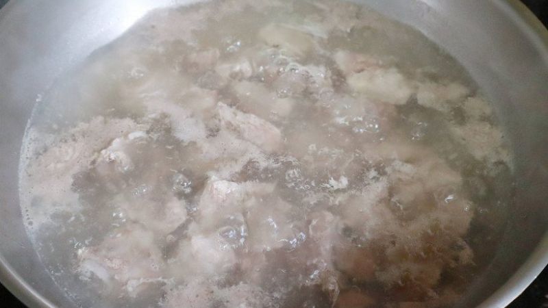 Simmering on high heat and covering the pot