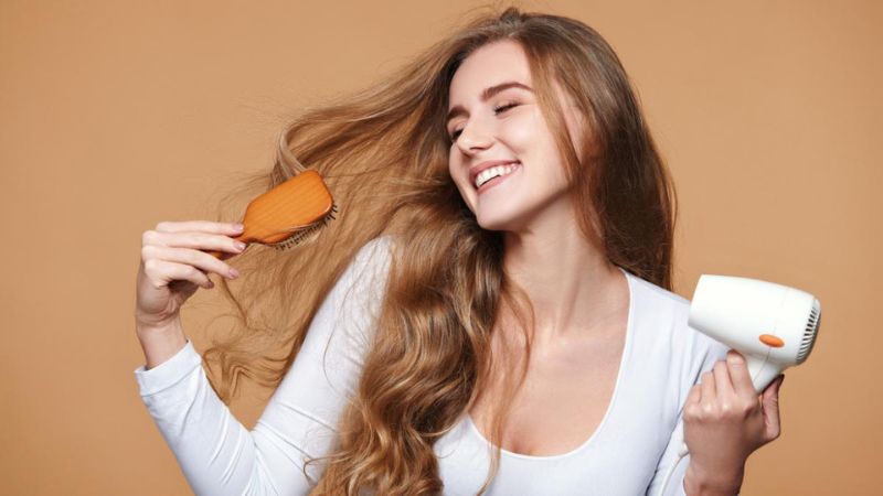 Use a round brush to detangle your hair