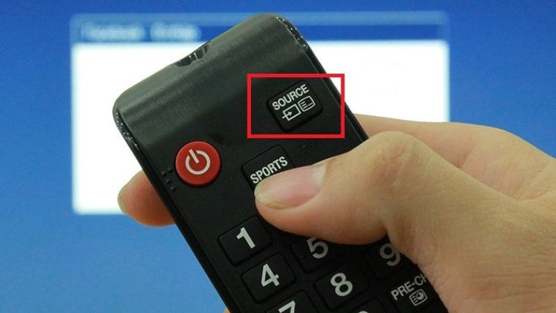 Bấm vào biểu tượng có hình mũi tên trên remote để chọn nguồn vào