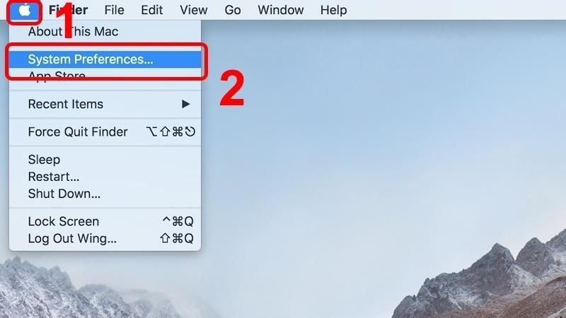 Nhấn vào biểu tượng Apple > Chọn System Preferences Nhấn vào biểu tượng Apple > Chọn System Preferences