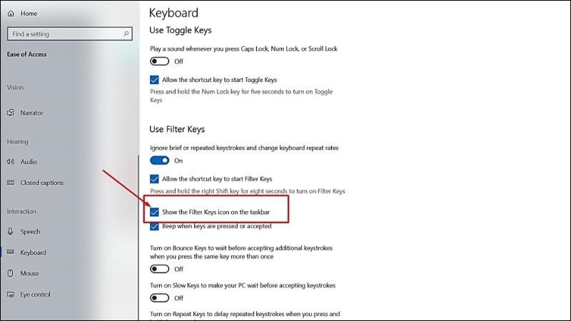 Tiếp tục kéo xuống tick vào mục Show the Filter Keys icon on the taskbar