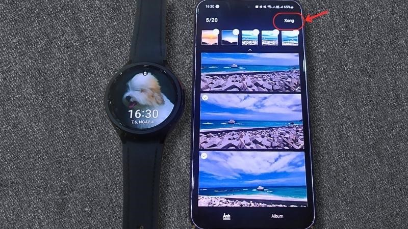 Chọn một hoặc nhiều ảnh bạn muốn thay nền đồng hồ > Chọn Xong