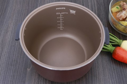 Lòng nồi bằng hợp kim nhôm tráng men chống dính 0- 3 mâm nhiệt - Nồi cơm điện Philips 2 lít HD3119