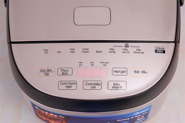 Nồi cơm điện tử Midea 1.8 lít MB-FS5023 Màu Vàng đồng