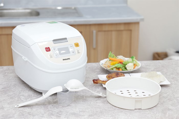 Nồi cơm điện tử Philips 1.8 lít HD3130 Màu Trắng - vàng đồng