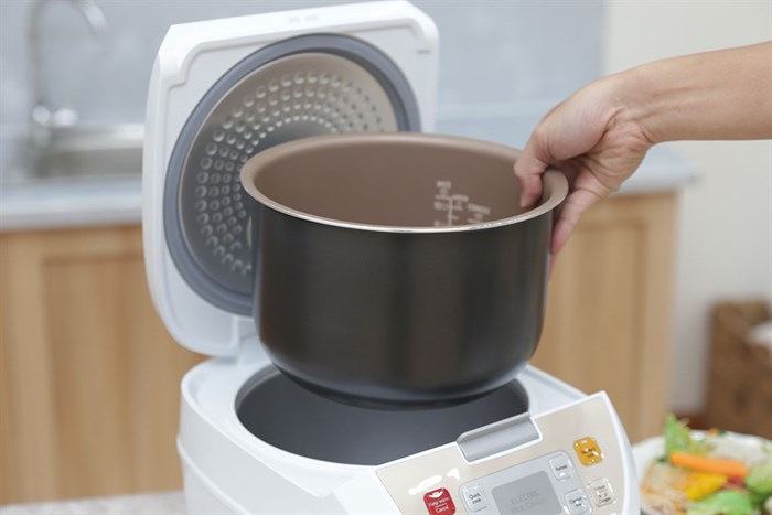 Nồi cơm điện tử Philips 1.8 lít HD3130 Màu Trắng - vàng đồng