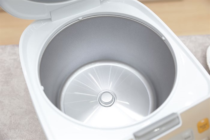 Nồi cơm điện tử Philips 1.8 lít HD3130 Màu Trắng - vàng đồng