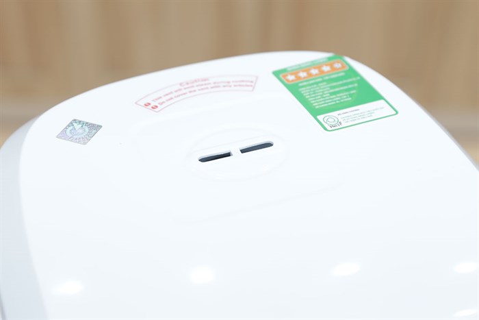 Nồi cơm điện tử Philips 1.8 lít HD3130 Màu Trắng - vàng đồng