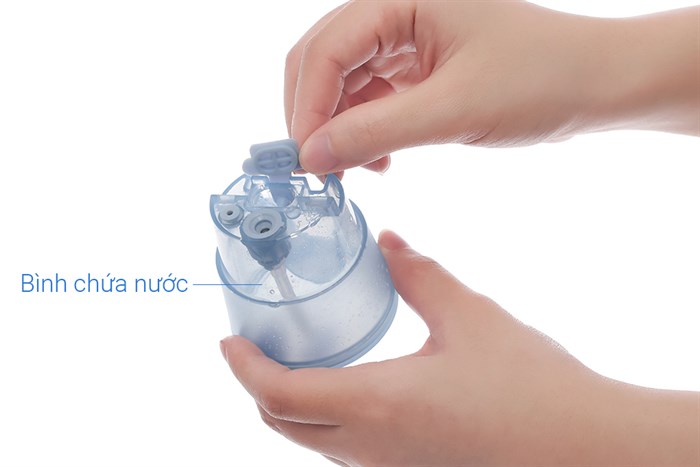 Bàn ủi hơi nước cầm tay Philips STH1000/10 980W Màu Trắng