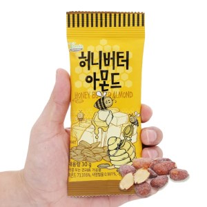 Hạt hạnh nhân tẩm bơ mật ong Tom's Farm gói 30g