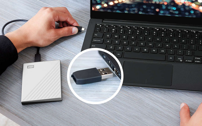 Ổ cứng HDD 2TB WD My Passport Ultra Bạc Ổ cứng HDD 2TB WD My Passport Ultra Bạc Gồm 1 cáp USB-C, 1 bộ chuyển đổi USB 3.0