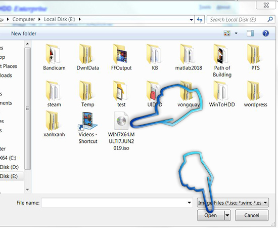 Bước 7: Bạn chọn file Window đuôi .iso bạn đã chuẩn bị và chọn open để nạp file.
