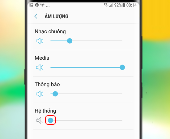 Bước 4: Cuối cùng bạn kéo hình tròn màu xanh ở Hệ thống về hết bên trái để tắt âm thanh.