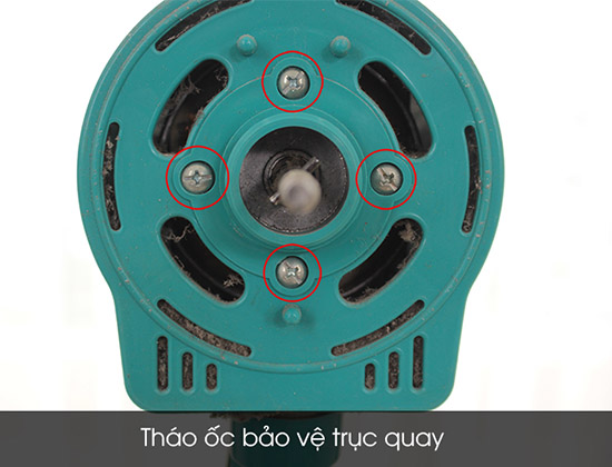  tháo ốc bảo vệ trục quay.