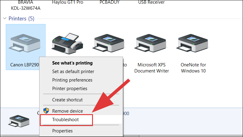 Nhấn chuột phải vào máy in đang bị lỗi chọn Troubleshoot