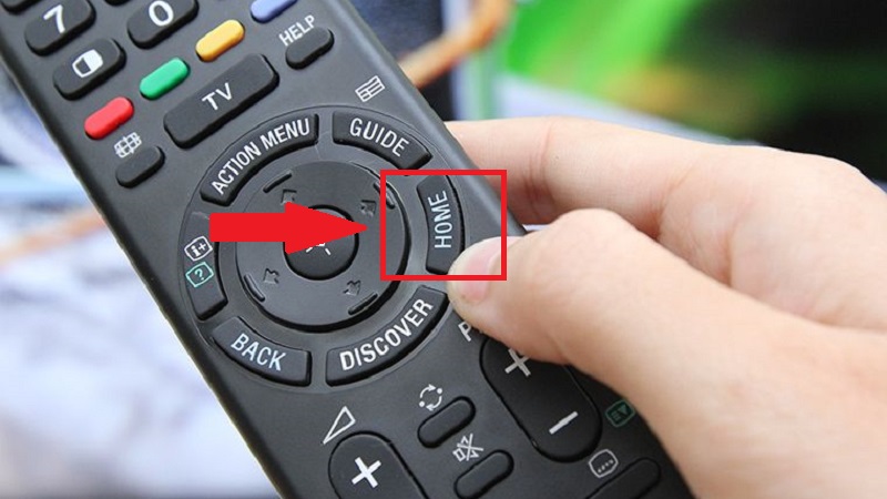 Nhấn nút HOME trên remote Tivi để về giao diện chính