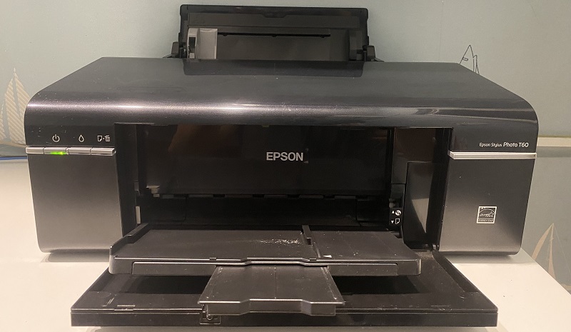 Máy in Epson T60 sau khi khởi động thì không chạy nữa