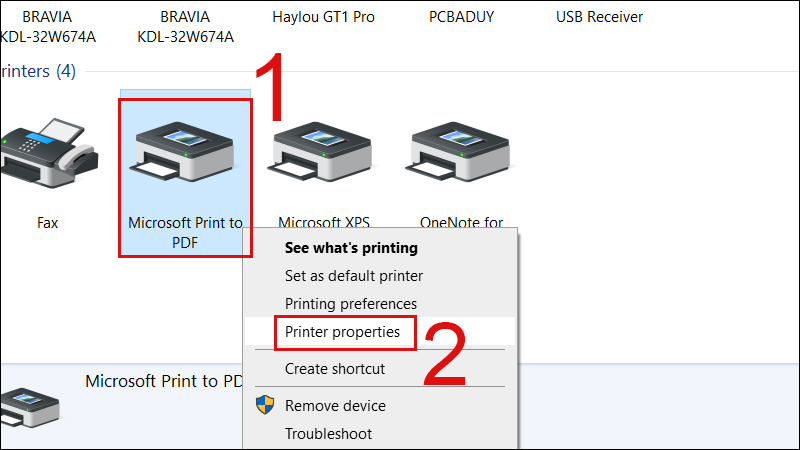 Nhấn chuột phải vào máy in, chọn Printer properties
