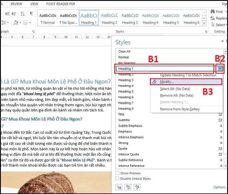 Chọn thẻ Heading 1 và ấn vào biểu tượng tam giác bên phải để chọn Modify