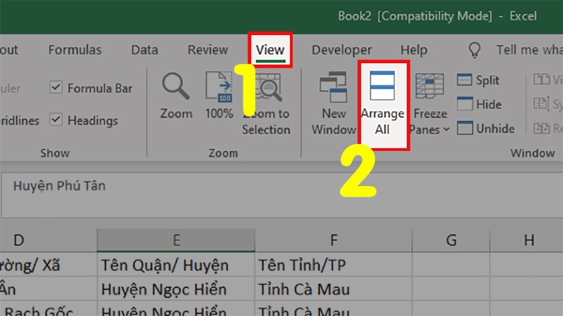 Mở tab View  Đi đến phần Windows  Chọn Arrange All