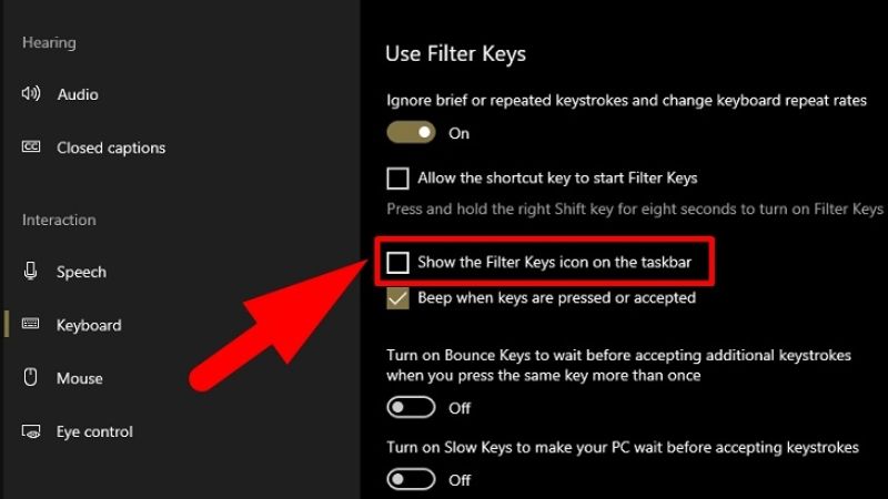 Chỉnh OFF ở phần Show the Filter Keys icon on the taskbar