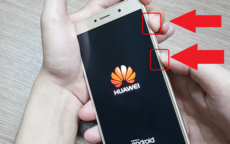 Nhấn giữ 2 phím nguồn và nút tăng âm lượng đến khi hiện ra giao diện của Huawei