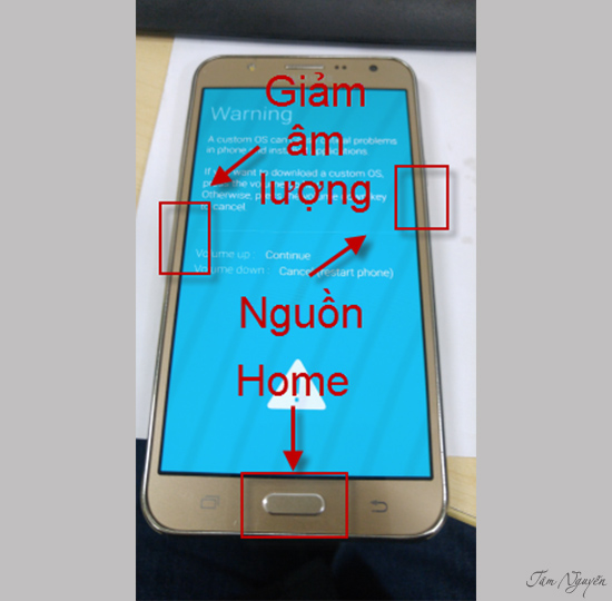 giảm âm lượng + Home + Nguồn
