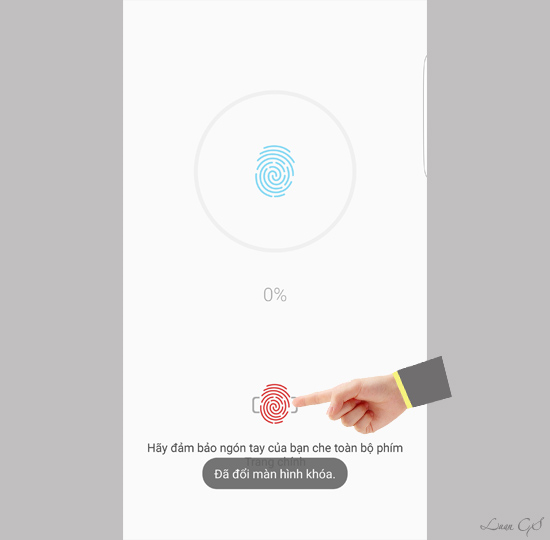 Đặt ngón tay của bạn vào nút 