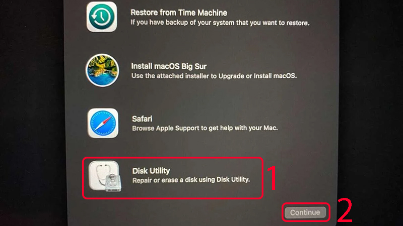 Chọn Disk Utility, sau đó bấm Continue