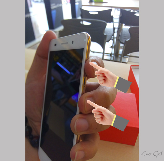 Bấm giữ nguồn cùng giảm âm lượng